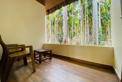 Balcony view overlooking the forest from a suite at Magenta Resort